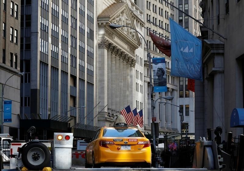 A taxicab enters the financial district security zone near the New York Stock Exchange (NYSE) in New York City, U.S., March 23, 2017. REUTERS/Brendan McDermid - RTX32GP0