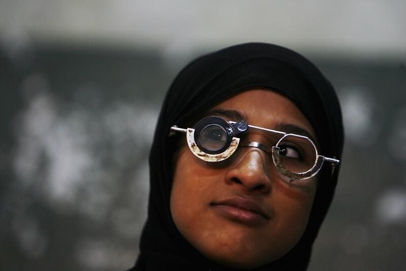 A woman gets her eyes tested at a free eye-care camp set up by voluntary organisation Karm in Mumbai February 15, 2009. According to a World Health Organisation report, 90 percent of the world's blind people live in developing countries with at least 9 million of them in India, where they are often the victims of poverty and lack of access to quality eye care.