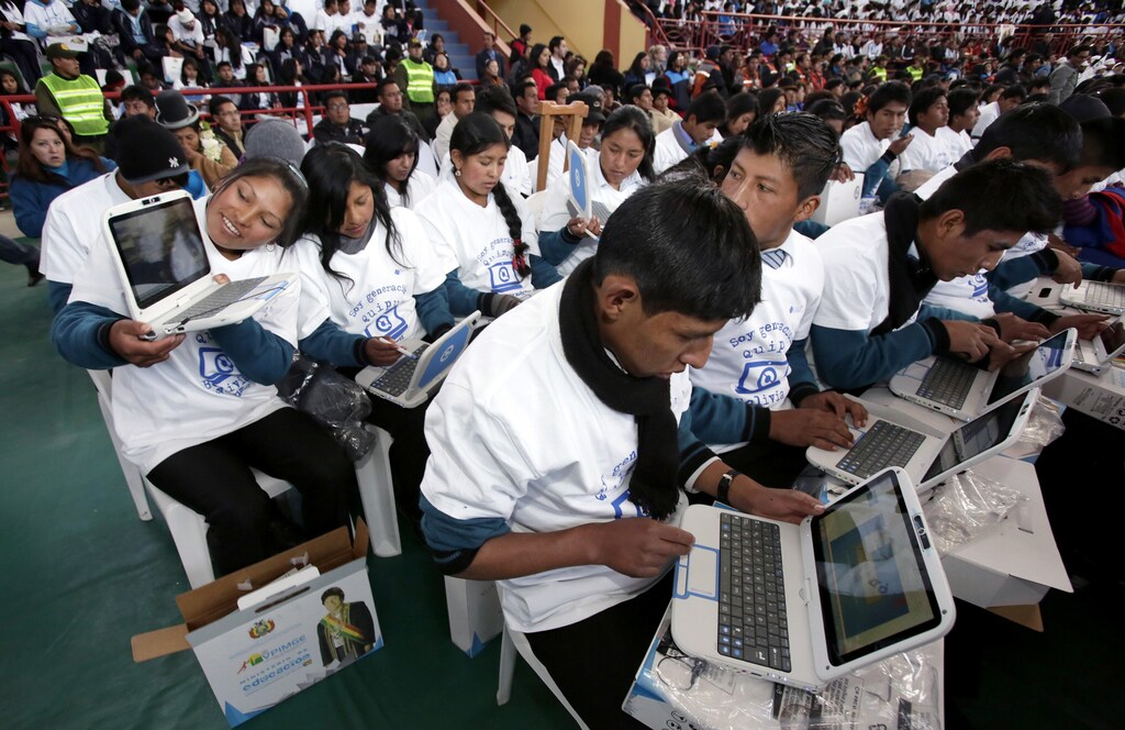 High school students test their "Quipus" laptops during a presentation ceremony in El Alto,.