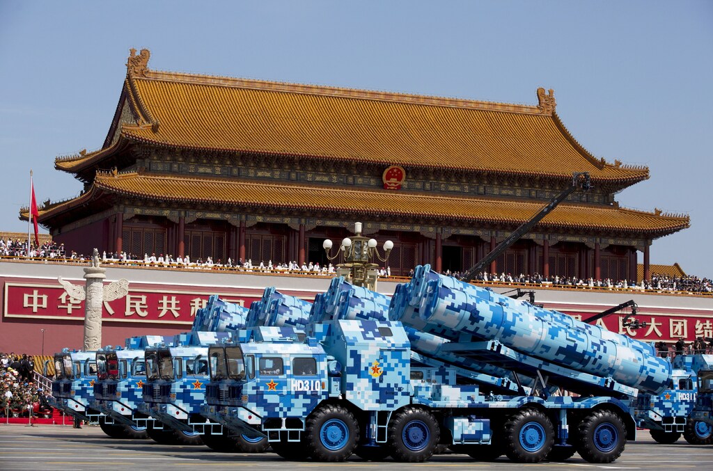Military vehicles carry DF-10 ship-launched cruise missiles as they travel past Tiananmen Gate during a military parade to commemorate the 70th anniversary of the end of World War II in Beijing Thursday Sept. 3, 2015