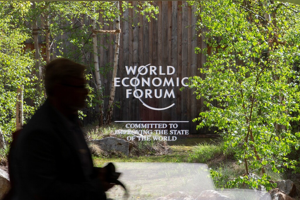 Davos 2022: The logo of the upcoming World Economic Forum 2022 (WEF) is pictured on a window at the congress center, in the Alpine resort of Davos, Switzerland May 21, 2022. REUTERS/Arnd Wiegmann