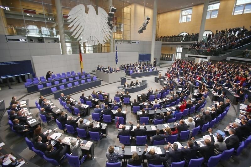 Delegates vote during the first plenary session at the German lower house of Parliament, Bundestag, after a general election in Berlin, Germany, October 24, 2017. REUTERS/Hannibal Hanschke - UP1EDAO0S3H23