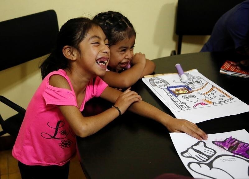 Children Mayra Gregorio and Filomena Jacinto are pictured after being sent back from detention on Tuesday, after they were separated from their parents at the U.S. border, in Guatemala City, Guatemala August 7, 2018.