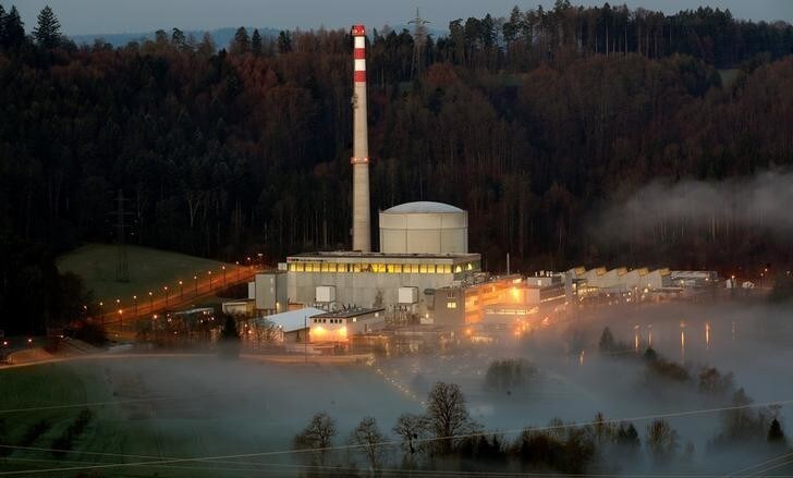 Swiss energy company BKW's Muehleberg nuclear power plant and the fog-covered Aare river are seen in Muehleberg near Bern, Switzerland, April 6, 2018. REUTERS/Arnd Wiegmann