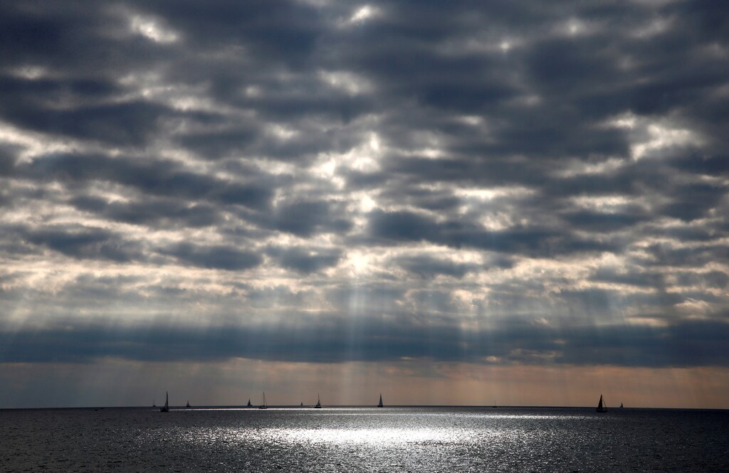Boats sail off the Bandol coast, Southern France, on a cloudy day, November 1, 2016. REUTERS/Jean-Paul Pelissier