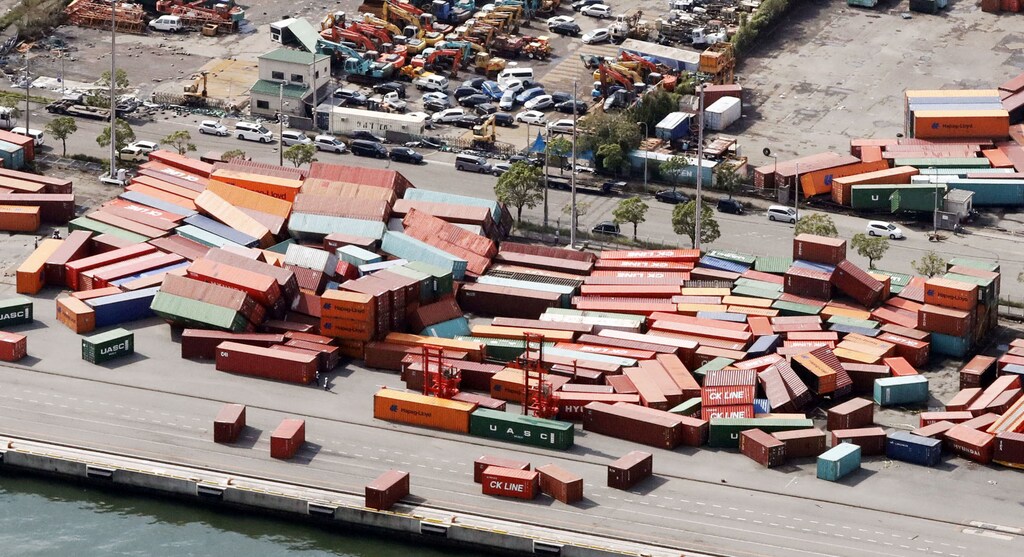 Containers damaged by Typhoon Jebi are seen in Kobe, western Japan, in this photo taken by Kyodo September 5, 2018. Mandatory credit Kyodo/via REUTERS ATTENTION EDITORS - THIS IMAGE WAS PROVIDED BY A THIRD PARTY. MANDATORY CREDIT. JAPAN OUT. NO COMMERCIAL OR EDITORIAL SALES IN JAPAN. - RC1A521A83F0