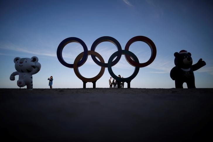 The 2018 PyeongChang Winter Olympics mascot Soohorang, Paralympics mascot Bandabi and the Olympic Rings are displayed at the Gyeongpodae beach in Gangneung, South Korea, October 31, 2017. REUTERS/Kim Hong-Ji