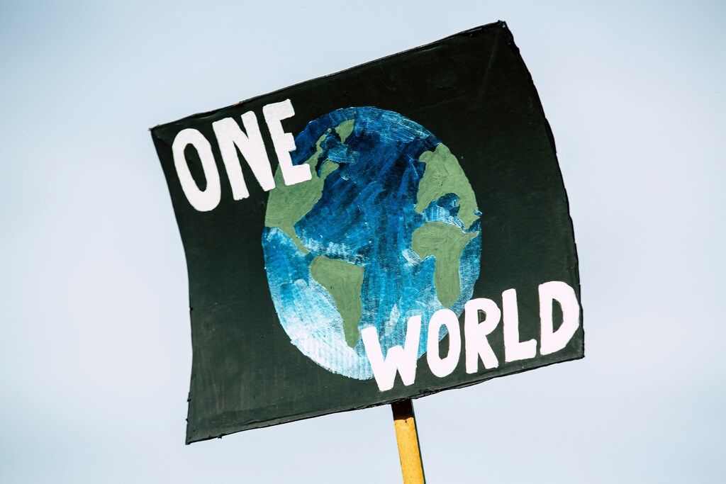 One world sign.