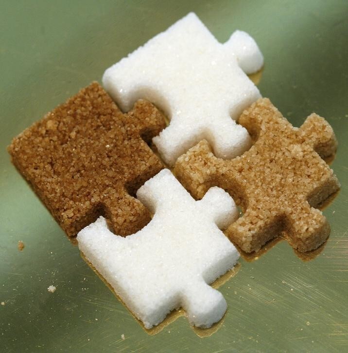 Puzzle pieces made of different types of sugars are exhibited during the Madrid Fusion 5th International Summit of Gastronomy in Madrid January 16, 2007. REUTERS/Victor Fraile (SPAIN)