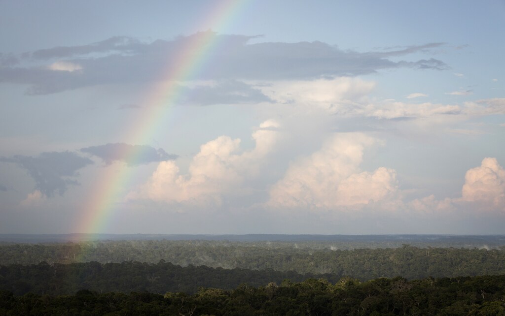 A rainbow is seen from the Amazon Tall Tower Observatory (ATTO) in Sao Sebastiao do Uatuma in the middle of the Amazon forest in Amazonas state January 8, 2015. The Amazon Tall Tower Observatory is a project of Brazil's National Institute of Amazonian Research and Germany's Max Planck Institute and will be equipped with high-tech instruments and an observatory to monitor relationships between the jungle and the atmosphere from next July. According to the institutes, ATTO will gather data on heat, water, carbon gas, winds, cloud formation and weather patterns. Picture taken on January 8, 2015. REUTERS/Bruno Kelly (BRAZIL - Tags: ENVIRONMENT SCIENCE TECHNOLOGY) - GM1EB1D1UHK01