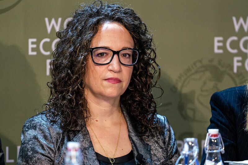 Close up of Amy Webb sitting on a panel at a World Economic Forum event