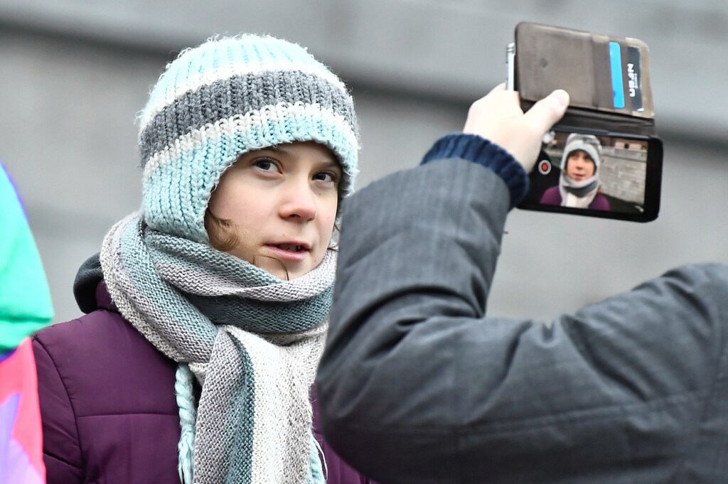 Swedish environmental activist Greta Thunberg celebrates her 17th birthday by attending the weekly "Fridays For Future" climate strike outside the Swedish parliament Riksdagen in Stockholm, Sweden January 3, 2020. TT News Agency/Claudio Bresciani/via REUTERS ATTENTION EDITORS - THIS IMAGE WAS PROVIDED BY A THIRD PARTY. SWEDEN OUT. NO COMMERCIAL OR EDITORIAL SALES IN SWEDEN. - RC288E9A1UP1