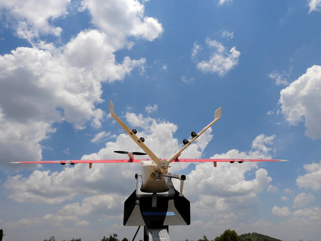 A drone is placed on a launch pad at operations center in Muhanda, south of Rwanda's capital Kigali where Zipline, a California-based robotics company delivered their first blood to patients using a drone October 12, 2016. Picture taken October 12, 2016. REUTERS/James Akena - D1BEUHXHQIAB