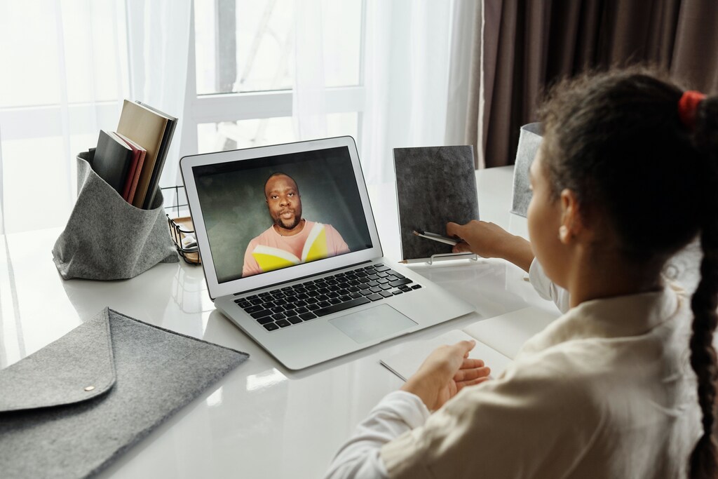 Girl taking an online school lesson.