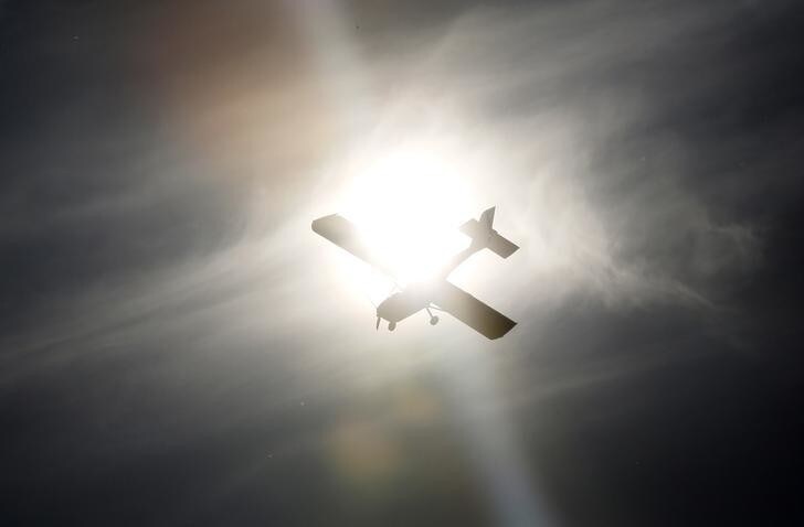 A Sierra light plane performs during a demonstration flight at an air show dedicated to the Day of Aviation at the Yemelyanovo airport near Russia's Siberian city of Krasnoyarsk, August 16, 2014. REUTERS/Ilya Naymushin (RUSSIA - Tags: TRANSPORT ANNIVERSARY)