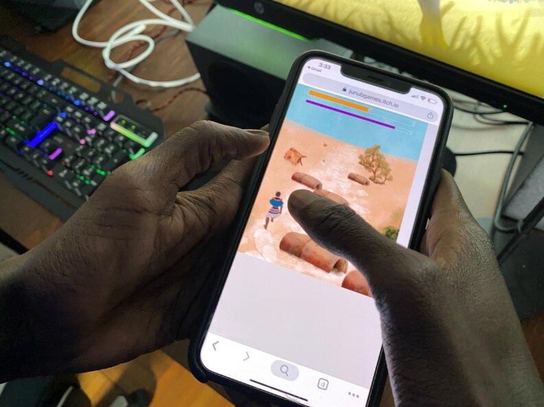 Video game developer Lual Mayen, 25, who learned to code in a refugee camp after fleeing South Sudan, plays his new game at his home in Washington, D.C., US, January 7
