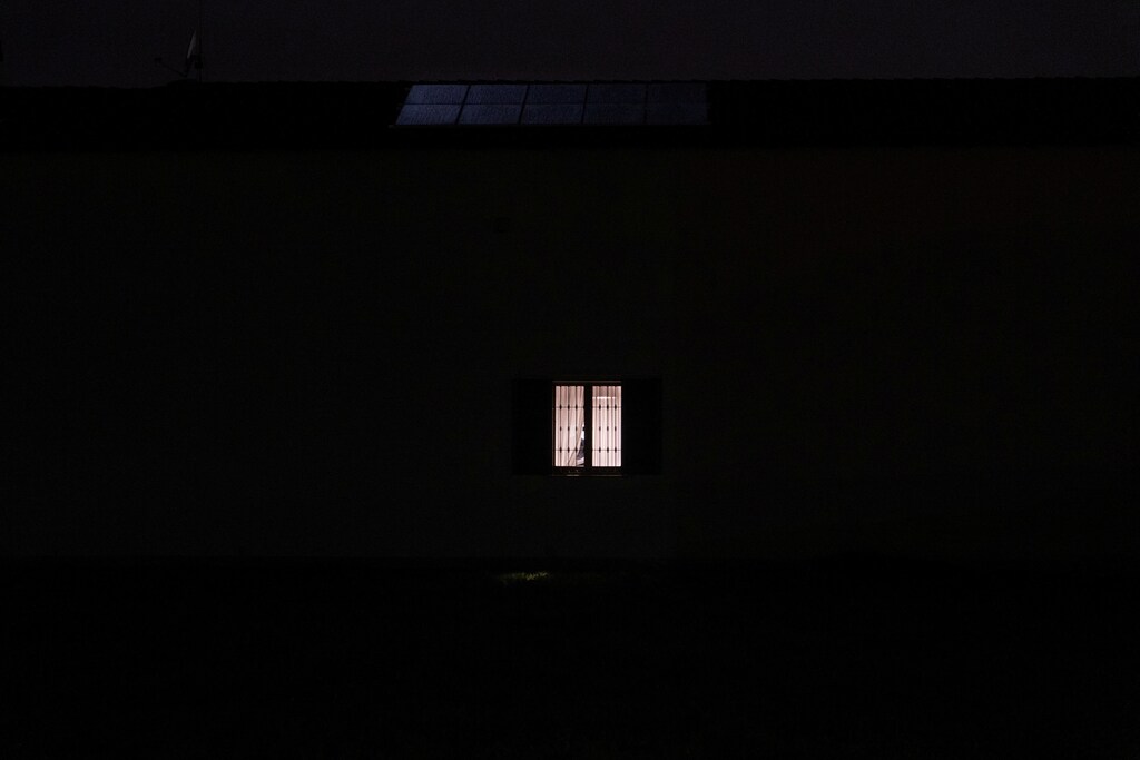 Life inside a red zone: A single light is switched on inside a house late at night in San Fiorano, one of the towns on lockdown in northern Italy due to a coronavirus outbreak, in this picture taken by schoolteacher Marzio Toniolo, March 3, 2020. Picture taken March 3, 2020. Marzio Toniolo/via REUTERS THIS IMAGE HAS BEEN SUPPLIED BY A THIRD PARTY. MANDATORY CREDIT - RC2TDF9QFNPE