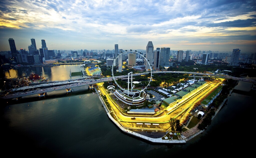 The Marina Bay street circuit of the Singapore Formula One Grand Prix is seen illuminated at dusk September 18, 2009.