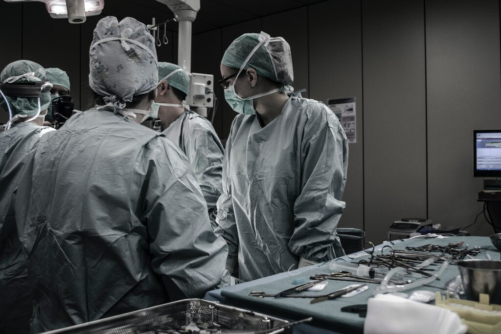 doctors performing a surgical operation