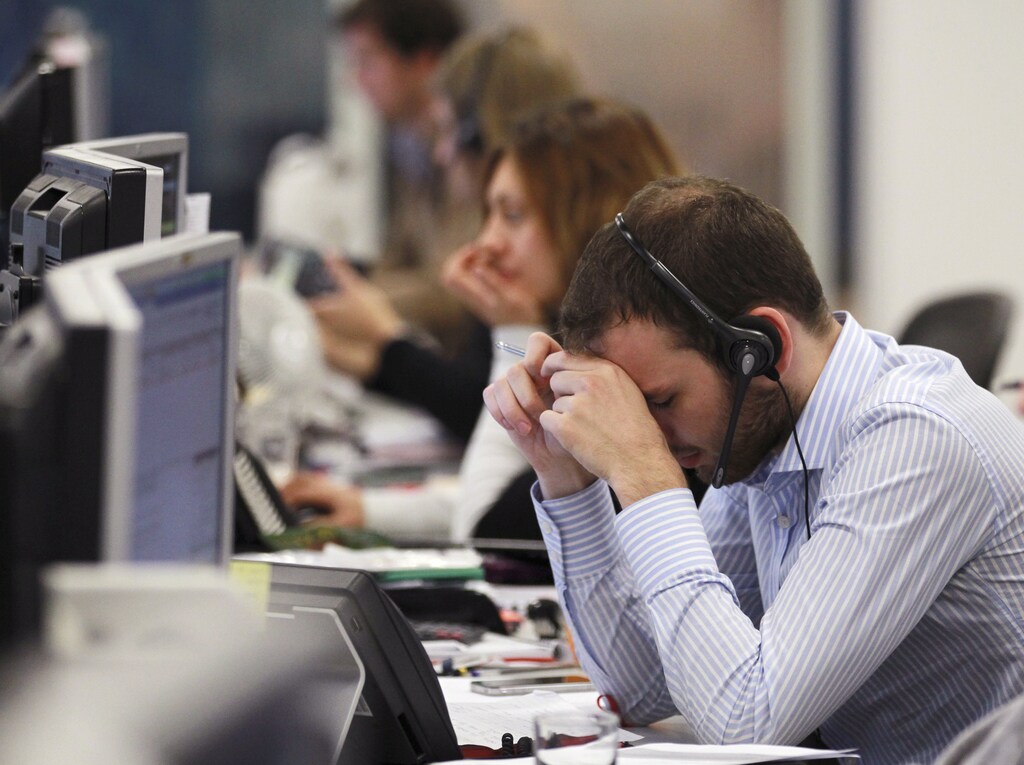A worker on a trading floor.