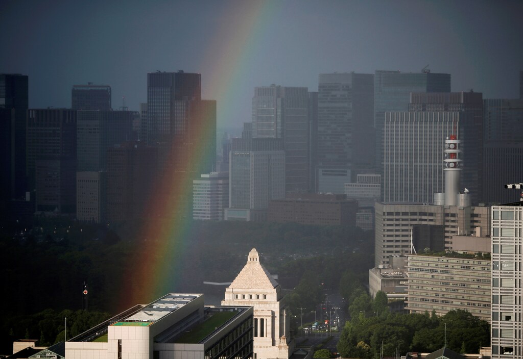 A rainbow is seen over the parliament building in Tokyo, Japan, July 4, 2016.