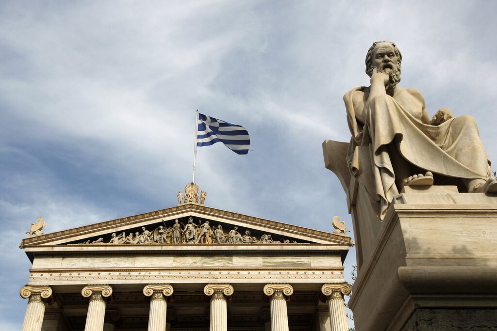 A statue of Greek philosopher Socrates is seen outside the Athens Academy