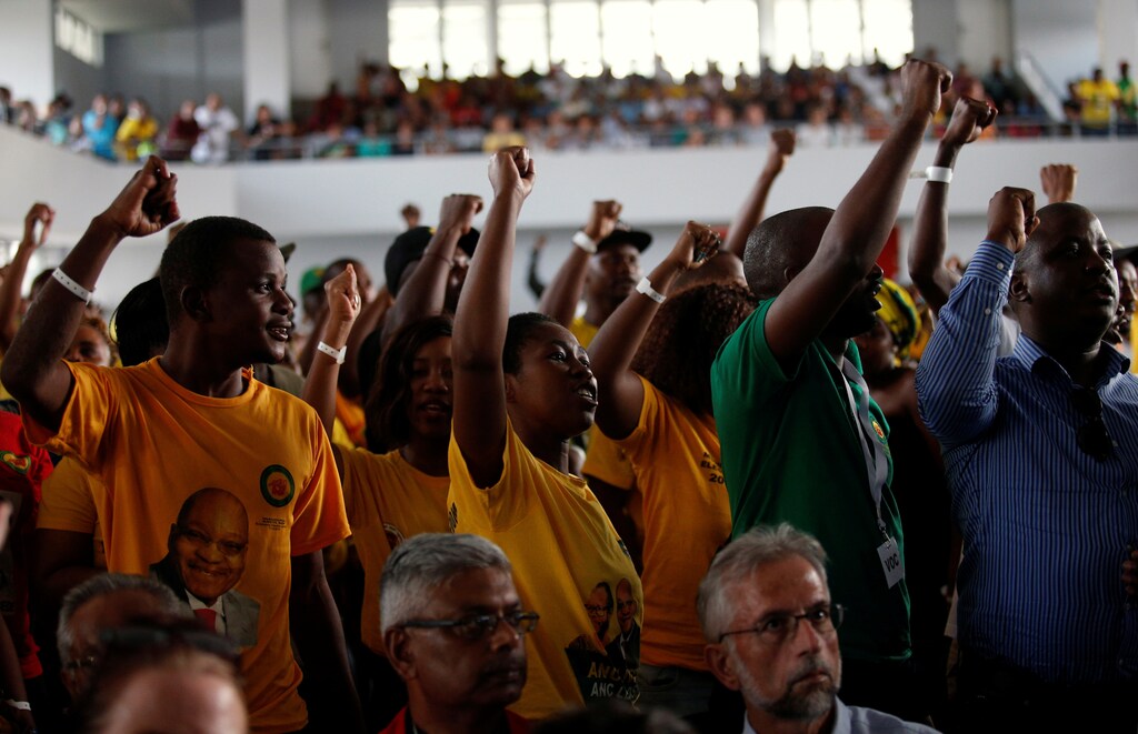 African National Congress Youth League members interrupt a memorial service for anti-apartheid activist Ahmed Kathrada in Durban, South Africa, April 9, 2017.