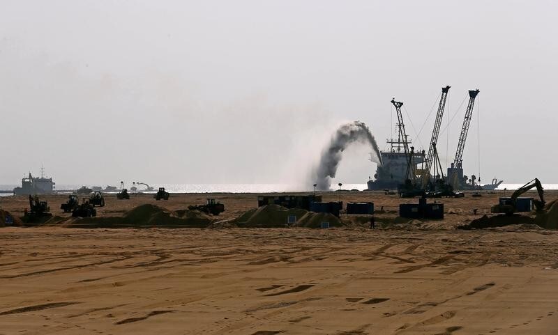 Sand is dredged from the sea at Colombo Port City construction site during the Sri Lanka's Prime Minister Ranil Wickremesinghe's (not pictured) visit in Colombo, Sri Lanka January 2, 2018. REUTERS/Dinuka Liyanawatte - RC15631DE4C0