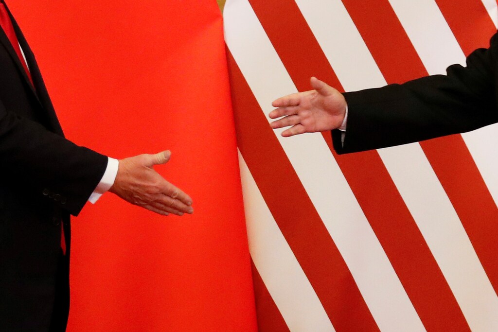 U.S. President Donald Trump and China's President Xi Jinping shakes hands after making joint statements at the Great Hall of the People in Beijing, China, November 9, 2017. REUTERS/Damir Sagolj TPX IMAGES OF THE DAY - RC1CF98AF4C0
