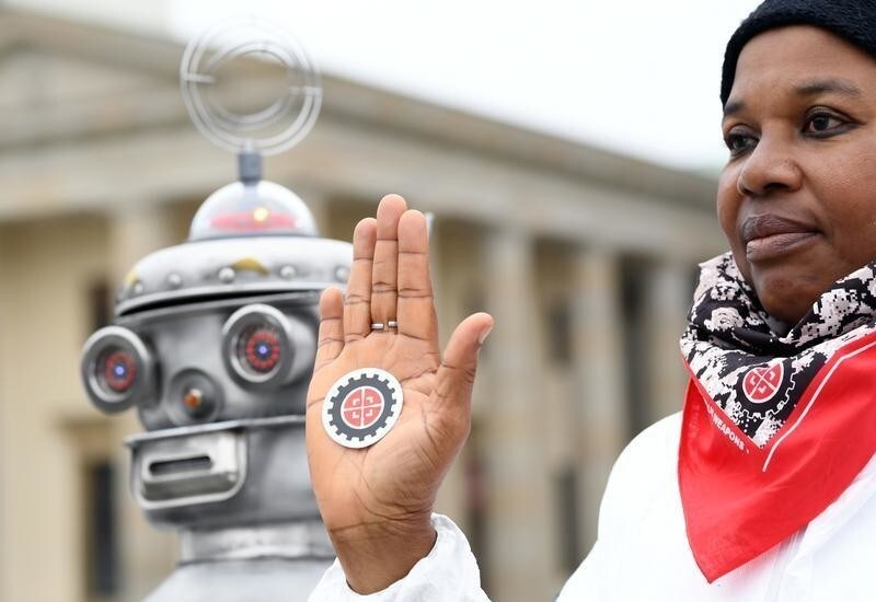 An activist from the Campaign to Stop Killer Robots, a coalition of non-governmental organisations opposing lethal autonomous weapons or so-called 'killer robots', protests at Brandenburg Gate in Berlin, Germany, March, 21, 2019. REUTERS/Annegret Hilse - RC1FFA9FEA70