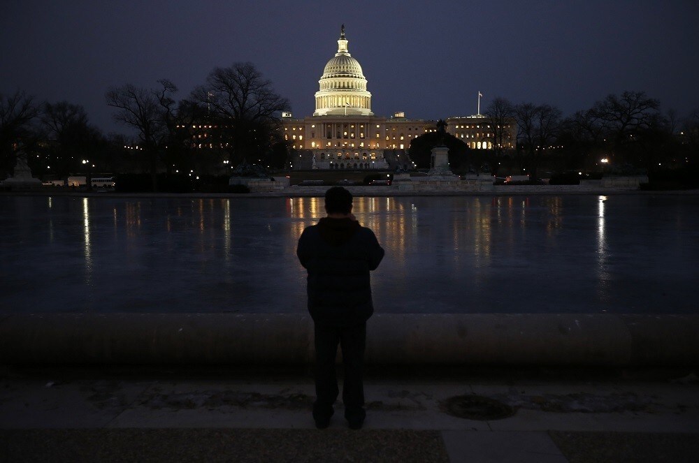The U.S. Capitol building is seen before U.S. President Barack Obama delivers his State of the Union address in front of the U.S. Congress, on Capitol Hill in Washington January 28, 2014. REUTERS/Kevin Lamarque (UNITED STATES - Tags: POLITICS) - RTX17YWW