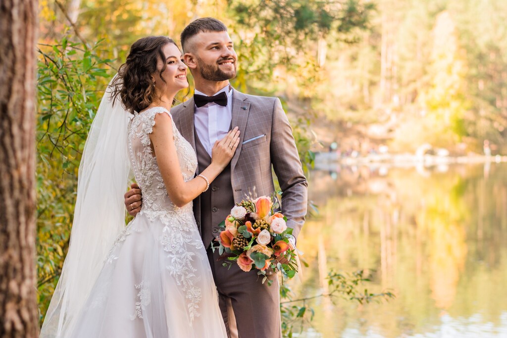 Man in grey suit and woman in white dress wedding photo: CRVS allows human rights and democracy.