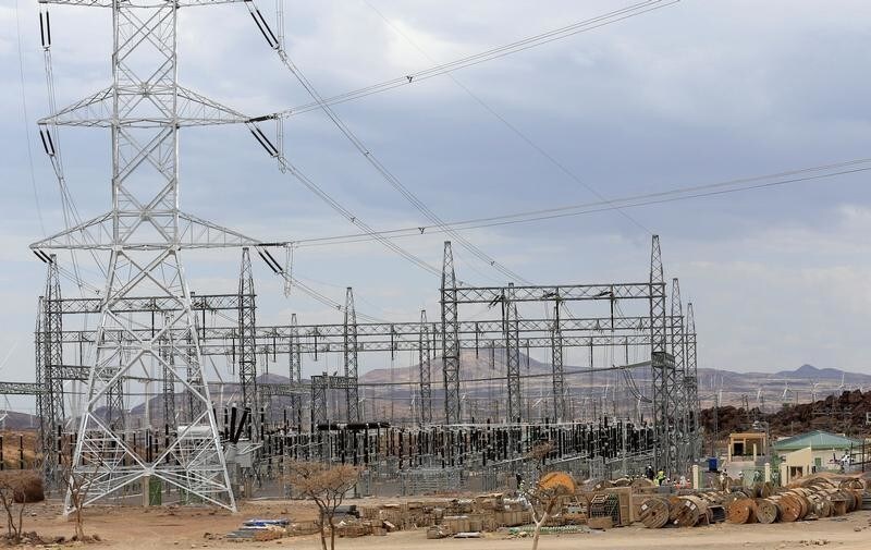 Power lines connecting pylons of high-tension electricity are seen from the power substation at the Lake Turkana Wind Power project (LTWP) in Loiyangalani district, Marsabit County, northern Kenya, September 4, 2018. Picture taken September 4, 2018. REUTERS/Thomas Mukoya - RC14A780C500