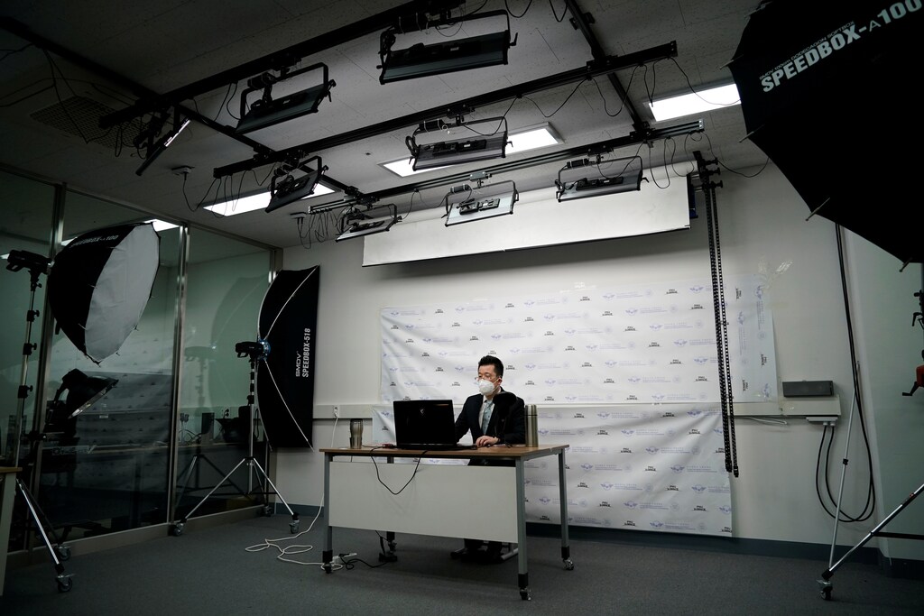A professor of Pusan National University Park Hyun who used to be a coronavirus patient, gives an online lecture at Pusan National University in Busan, South Korea, March 30, 2020.