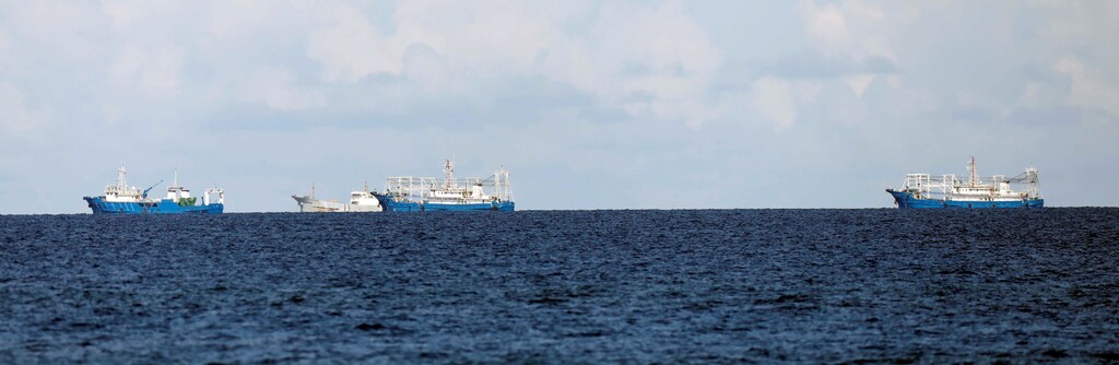 Chinese vessels are pictured in disputed South China Sea, April 21, 2017. REUTERS/Erik De Castro - RTS1394W