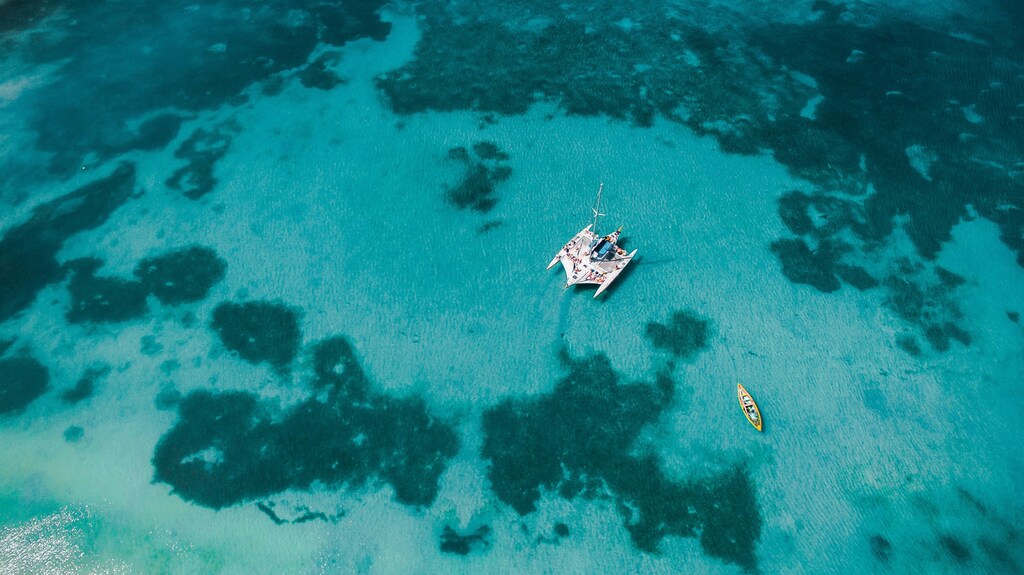 A white boat on blue sea water: The blue economy is facing a significant funding gap