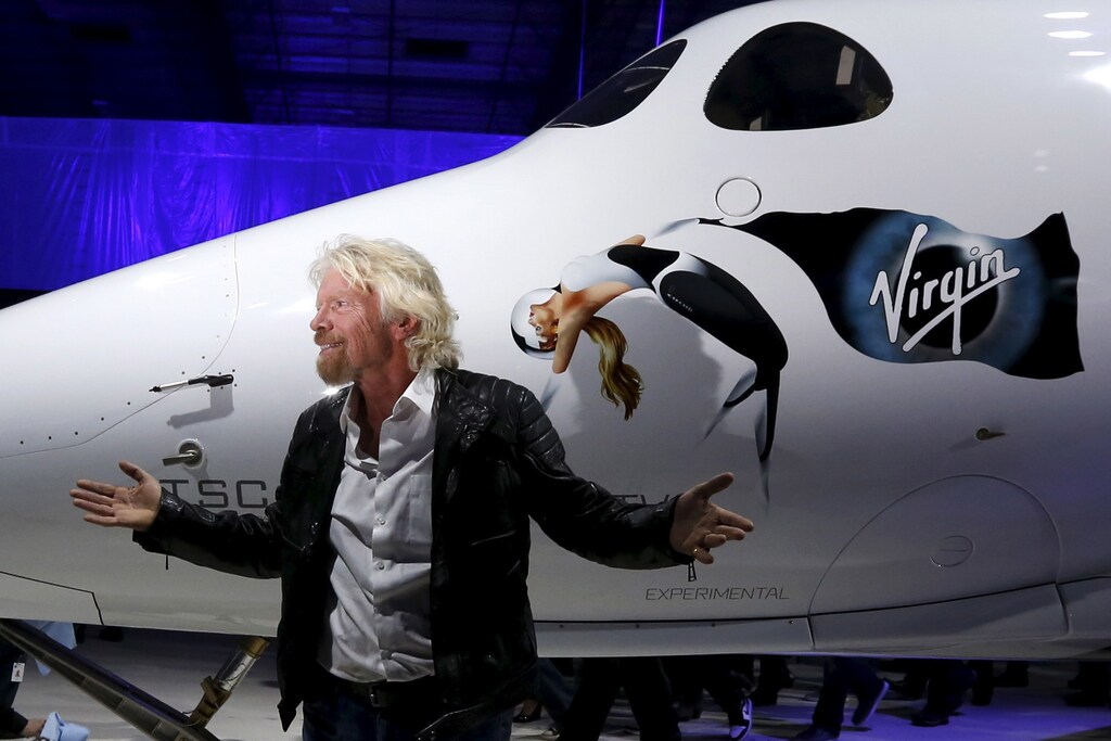 Richard Branson poses after unveiling the new SpaceShipTwo, a six-passenger two-pilot vehicle meant to ferry people into space that replaces a rocket destroyed during a test flight in October 2014, in Mojave, California, United States, February 19, 2016.