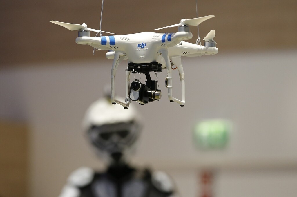 A drone with Sony Action Cam Mini is pictured at the IFA consumer technology fair in Berlin, September 5, 2014. REUTERS/Fabrizio Bensch (GERMANY - Tags: BUSINESS SCIENCE TECHNOLOGY) - RTR452Y3