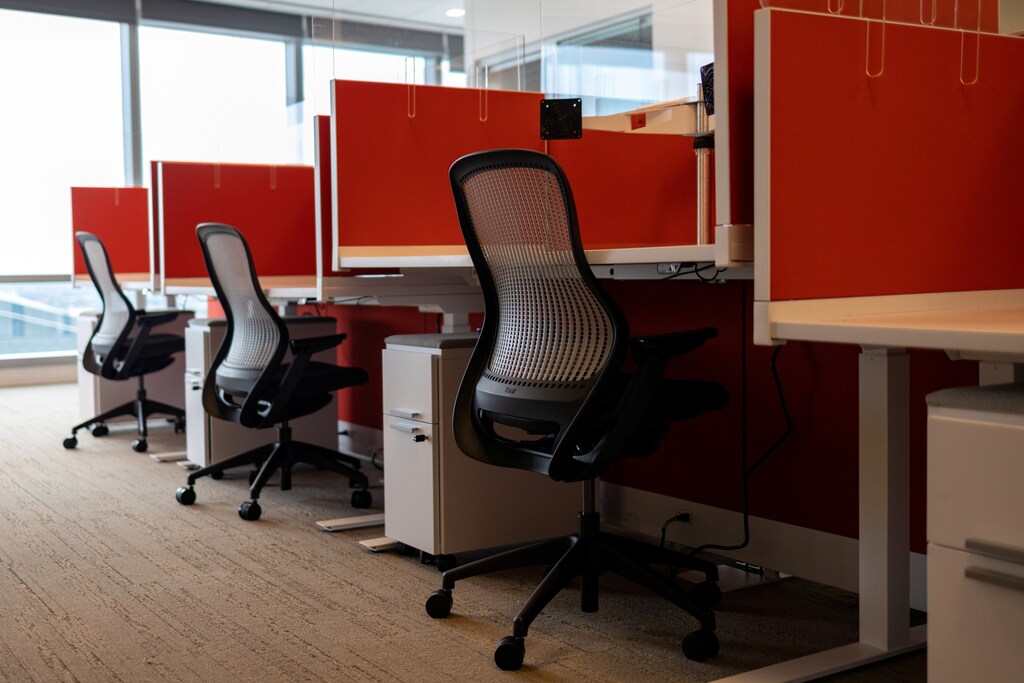 Empty cubicles are seen as the first phase of FMC Corporation employees return to work in the office