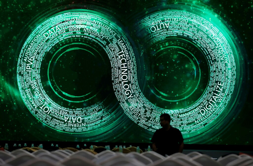 A man stands at a main hall for Internet Security Conference 2018 in Beijing, China September 4, 2018. REUTERS/Jason Lee TPX IMAGES OF THE DAY - RC1D39B89D00