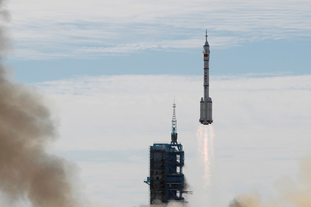 The Long March-2F Y12 rocket, carrying the Shenzhou-12 spacecraft and three astronauts, takes off from Jiuquan Satellite Launch Center for China's first manned mission to build its space station, near Jiuquan, Gansu province, China June 17, 2021. REUTERS/Carlos Garcia Rawlins - RC212O9KHZLQ