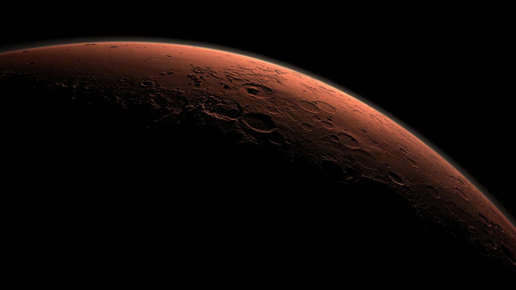 This computer-generated view depicts part of Mars at the boundary between darkness and daylight, with an area including Gale Crater beginning to catch morning light, in this handout image provided by NASA. It may not be space debris, errant asteroids, supply shortages, thruster malfunctions or even the malevolent aliens envisioned in so many Hollywood films that thwart astronauts on any mission to Mars. It may be the ubiquitous galactic cosmic rays. Researchers said on May 1, 2015 long-term exposure to these rays that permeate space may cause dementia-like cognitive impairments in astronauts during any future round-trip Mars trip, expected to take at least 2-1/2 years. REUTERS/NASA/JPL-Caltech/Handout FOR EDITORIAL USE ONLY. NOT FOR SALE FOR MARKETING OR ADVERTISING CAMPAIGNS. THIS IMAGE HAS BEEN SUPPLIED BY A THIRD PARTY. IT IS DISTRIBUTED, EXACTLY AS RECEIVED BY REUTERS, AS A SERVICE TO CLIENTS - TM3EB4U1BZW01