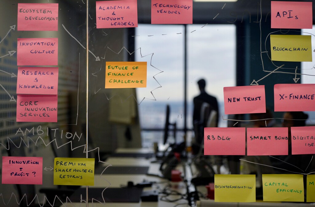 Post-it notes are displayed in the UBS "fintech lab" at Canary Wharf in London, Britain, October 19, 2016. REUTERS/Hannah McKay - RTX2PJIF