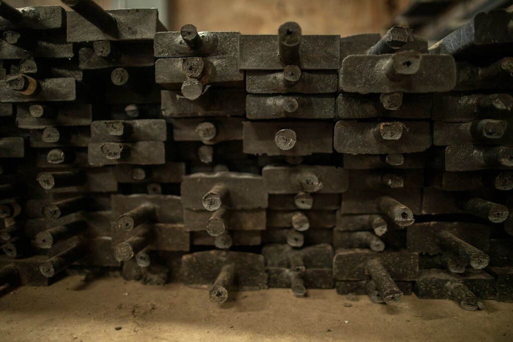 Waterproof planks made of plastics are stacked in the factory of social enterprise The Plastic Flamingo or The Plaf, in Muntinlupa, Philippines, October 18, 2021.