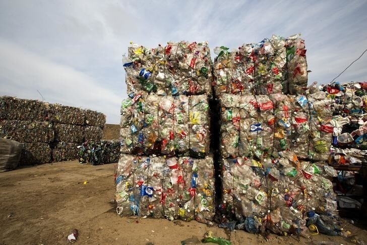 Pressed plastic waste ready for loading are seen at the Ecores waste processing enterprise on the outskirts of Minsk, March 12, 2015. According to a representative of the enterprise, it collects about 30,000 tons of waste, including plastic, glass and paper, annually from the Belarussian capital of Minsk and surrounding region, after which the sorted waste will be sent for further processing. REUTERS/Vasily Fedosenko