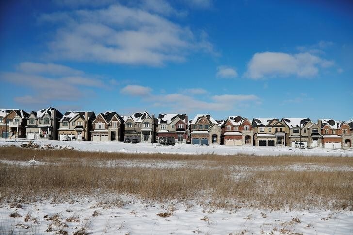 A row of houses stand in a newly built subdivision in East Gwillimbury, Ontario, Canada, January 30, 2018. Picture taken January 30, 2018. REUTERS/Mark Blinch