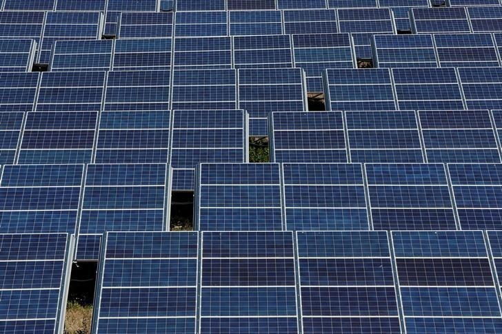 Solar panels to produce renewable energy are seen at the Urbasolar photovoltaic park in Gardanne, France, June 25, 2018. REUTERS/Jean-Paul Pelissier