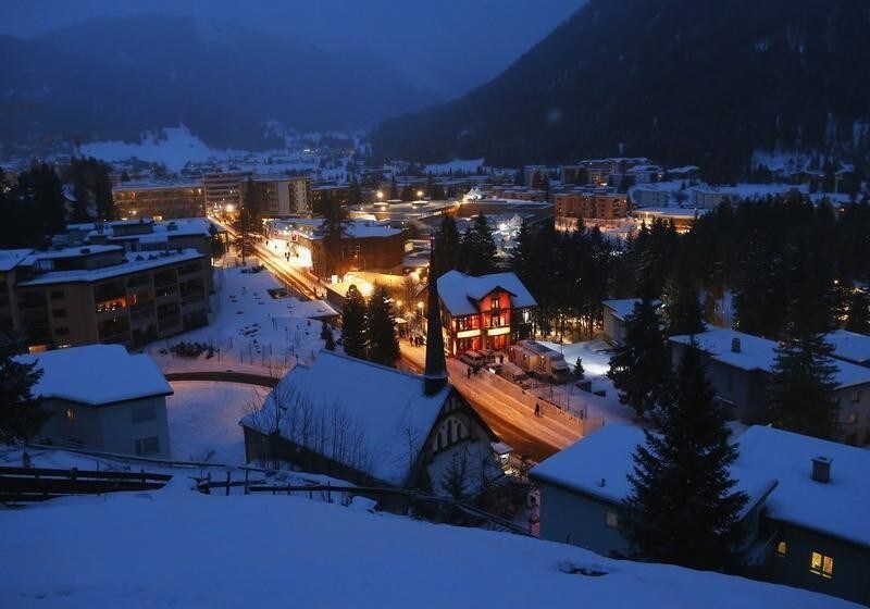 A view of Davos with the Congress Center in the early morning of the annual meeting of the World Economic Forum (WEF) 2014 in Davos January 24, 2014. The annual Davos gathering, which draws thousands of the world's most powerful people, will this year welcome more than 40 heads of state and government to focus on questions about the world's future, organisers said on Wednesday. This year's event will run from January 22 to 25. REUTERS/Ruben Sprich (SWITZERLAND - Tags: POLITICS BUSINESS ENVIRONMENT CITYSCAPE) - GM1EA1O15RA01
