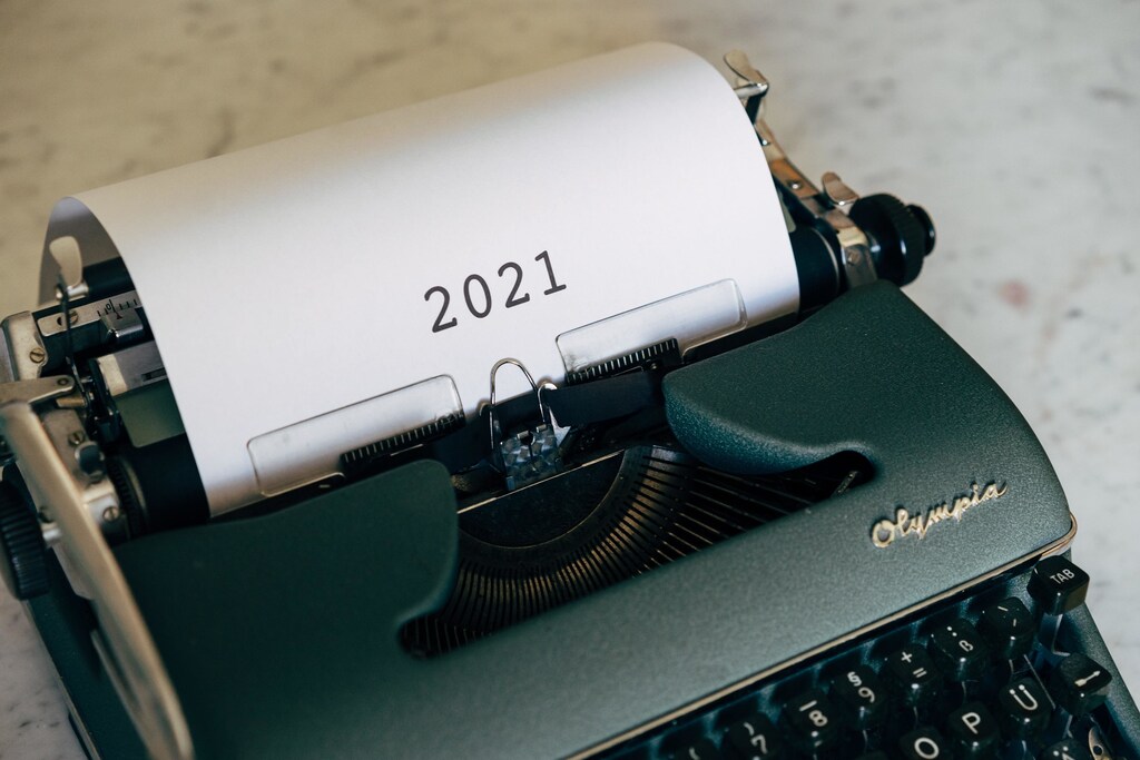 A typewriter showing 2021.