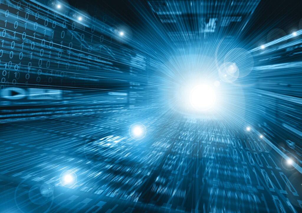 Light and binary numbers representing the future of the digital economy: An Open Transaction Network is open-source, community supported and standardized for seamless transactions across organizations.